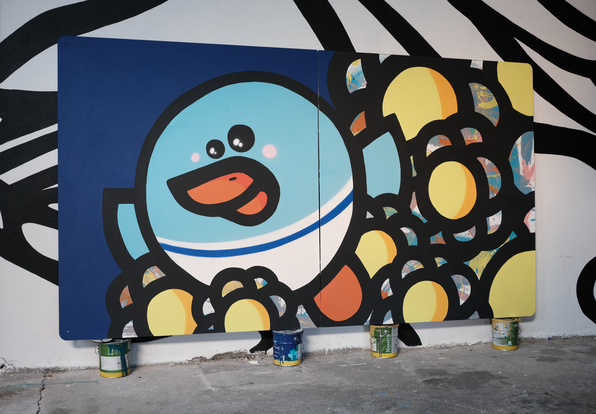 Deux tableaux (1 diptyque) de l'artiste Pec et de Anamorphose. On y voit des couleurs vives, un oiseau / canard (knar)